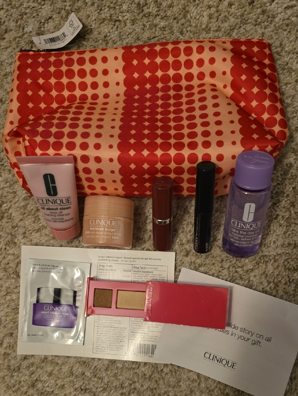Clinique Lipstick and Skincare Travel Gift Set with Coral/Red Dot Cosmetic Bag
